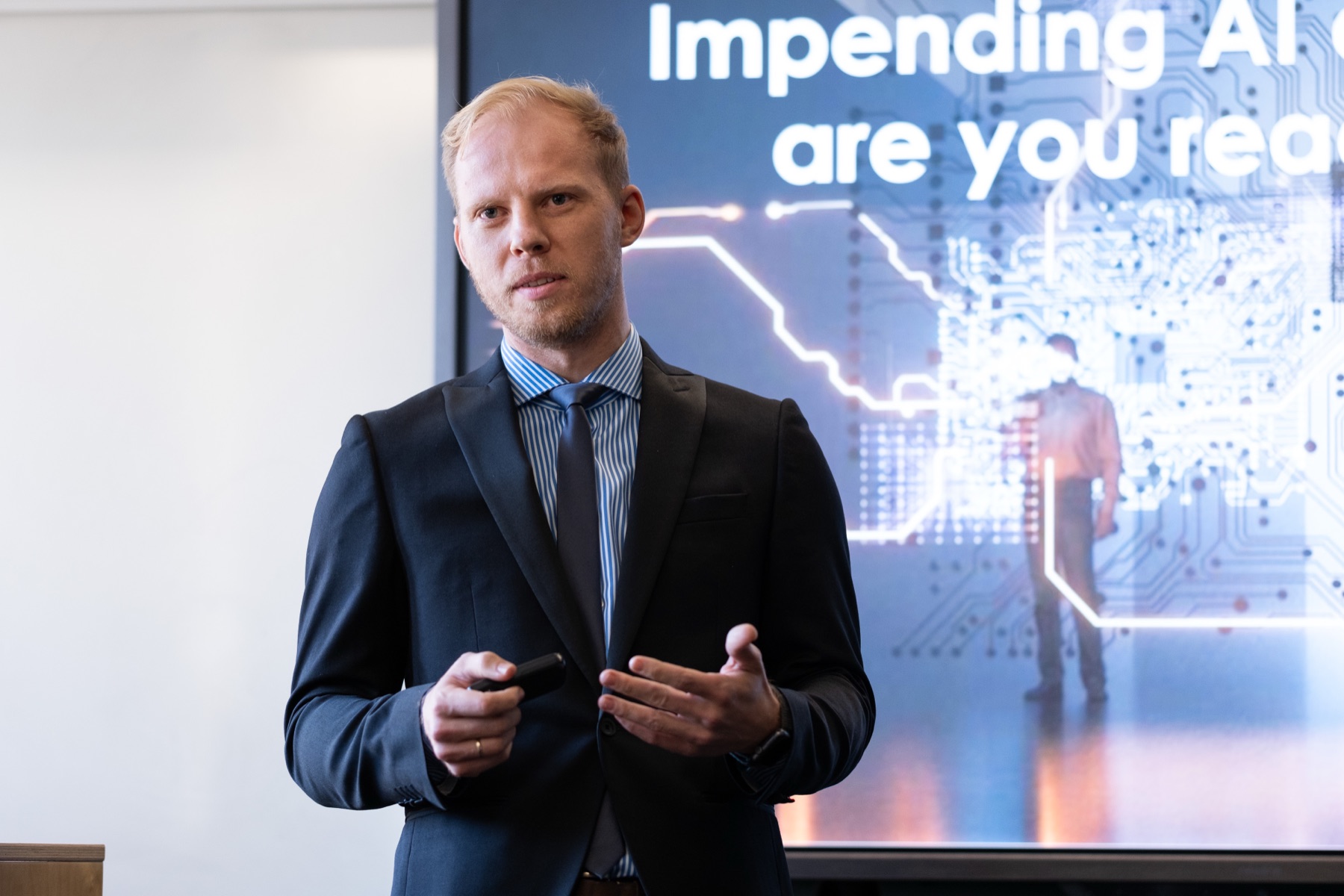 Rihards Garančs delivering an AI keynote